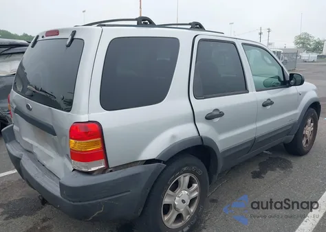 2002 Ford Escape Xlt z USA, uszkodzony, nr VIN 1FMYU04192KC73886
